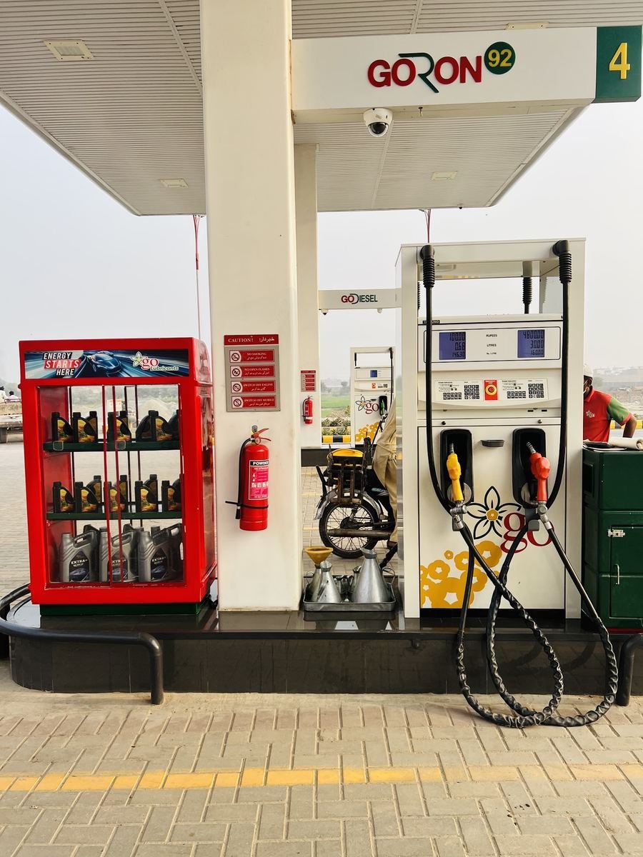 A GORON 92 fuel dispenser and the GO Lubricants display at Lucky Petroleum